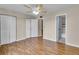 Bedroom with wood floors, double closets and bathroom access at 1836 N Crystal Lake Dr # 31, Lakeland, FL 33801