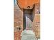 Brick building exterior with a brown door and walkway at 1836 N Crystal Lake Dr # 31, Lakeland, FL 33801