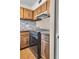 Modern stove and wood cabinets in this kitchen at 1836 N Crystal Lake Dr # 31, Lakeland, FL 33801
