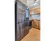 Stainless steel appliances and wood cabinets feature in this kitchen at 1836 N Crystal Lake Dr # 31, Lakeland, FL 33801