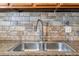 Double stainless steel sink with modern faucet at 1836 N Crystal Lake Dr # 31, Lakeland, FL 33801
