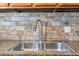 Double stainless steel sink with modern faucet at 1836 N Crystal Lake Dr # 31, Lakeland, FL 33801