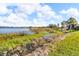 Peaceful lake view with grassy shoreline at 1836 N Crystal Lake Dr # 31, Lakeland, FL 33801