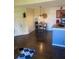 Bright dining area with table and chairs, hardwood floors at 2030 Cascades Blvd # 302, Kissimmee, FL 34741