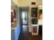 Hardwood floors and view into living room at 2030 Cascades Blvd # 302, Kissimmee, FL 34741
