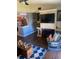 Living room with fireplace and built in shelving at 2030 Cascades Blvd # 302, Kissimmee, FL 34741