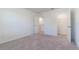 Bedroom with two closets and carpet flooring at 2076 Cades Cove Way, Deland, FL 32720