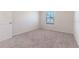 Bright bedroom with carpeted floor at 2076 Cades Cove Way, Deland, FL 32720