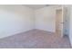 Spacious bedroom with carpet and access to closet at 2076 Cades Cove Way, Deland, FL 32720