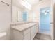 Bright bathroom featuring a vanity and access to bedroom at 2076 Cades Cove Way, Deland, FL 32720