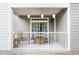 Spacious patio with table and chairs, offering a peaceful setting at 3177 Feltrim Pl # 104, Kissimmee, FL 34747