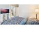 Comfortable bedroom with ensuite bathroom access at 3177 Feltrim Pl # 104, Kissimmee, FL 34747