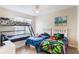 bedroom with twin beds and playful decor at 3177 Feltrim Pl # 104, Kissimmee, FL 34747