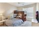 Bedroom with built-in bunk bed and study area at 3177 Feltrim Pl # 104, Kissimmee, FL 34747