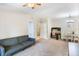 Open concept living area with dining and work areas at 3177 Feltrim Pl # 104, Kissimmee, FL 34747