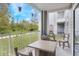Relaxing patio with table and chairs, perfect for outdoor dining at 3177 Feltrim Pl # 104, Kissimmee, FL 34747