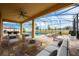 Relaxing pool area with covered patio and lounge chairs at 3303 Kayak Way, Orlando, FL 32820