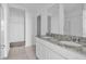 Bright bathroom with double vanity and granite countertop at 416 Mckenna Dr, Winter Haven, FL 33881