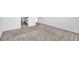 Bedroom with neutral carpeting and access to bathroom at 416 Mckenna Dr, Winter Haven, FL 33881