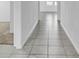 Clean hallway with tile floor and carpet at 416 Mckenna Dr, Winter Haven, FL 33881