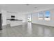 Open concept kitchen with island and stainless steel appliances at 416 Mckenna Dr, Winter Haven, FL 33881