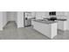 Open concept kitchen with island and stainless steel appliances at 416 Mckenna Dr, Winter Haven, FL 33881