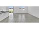 Bright living room with tile flooring and sliding glass doors at 416 Mckenna Dr, Winter Haven, FL 33881