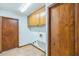 Laundry room with cabinets, a sink, and built-in storage at 4834 Hall Rd, Orlando, FL 32817