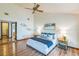Spacious bedroom with wood floors and a view of the backyard at 4834 Hall Rd, Orlando, FL 32817