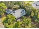 Aerial view of house and surrounding lush vegetation at 4834 Hall Rd, Orlando, FL 32817