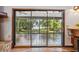 View of lake from the screened porch, accessible from the living room at 4834 Hall Rd, Orlando, FL 32817