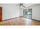 Spacious bedroom with sliding glass doors leading to patio at 4834 Hall Rd, Orlando, FL 32817
