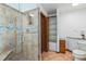Bathroom with walk-in shower, tile flooring and linen closet at 4834 Hall Rd, Orlando, FL 32817