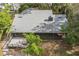 Home features a large screened porch and deck at 4834 Hall Rd, Orlando, FL 32817