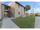 Two-story building with stairs and walkway at 5208 Via Hacienda Cir # 201, Orlando, FL 32839