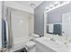 Clean bathroom with a shower/tub combo and updated vanity at 5208 Via Hacienda Cir # 201, Orlando, FL 32839