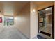 Apartment hallway with access to unit and fire extinguisher at 5208 Via Hacienda Cir # 201, Orlando, FL 32839