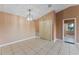 Bright dining area with tile flooring and a chandelier at 5208 Via Hacienda Cir # 201, Orlando, FL 32839
