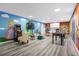 Fun game room with Mario theme, arcade game, and foosball at 8881 Qin Loop, Kissimmee, FL 34747
