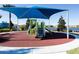 Shaded playground with modern play equipment at 8881 Qin Loop, Kissimmee, FL 34747