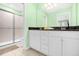 Bathroom with double vanity and walk-in shower at 8881 Qin Loop, Kissimmee, FL 34747