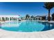Inviting resort-style pool with expansive sundeck at 8881 Qin Loop, Kissimmee, FL 34747