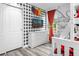 ' bedroom with bunk beds, dresser and Mickey Mouse theme at 8881 Qin Loop, Kissimmee, FL 34747
