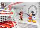 ' bedroom with bunk beds and Mickey Mouse theme at 8881 Qin Loop, Kissimmee, FL 34747