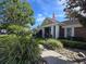 Community building with landscaping and walkway at 13103 Mulberry Park Dr # 817, Orlando, FL 32821