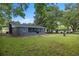 Charming home with a large grassy backyard at 1419 Ne 21St St, Ocala, FL 34470