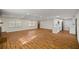 Open concept living and kitchen area with hardwood floors at 1419 Ne 21St St, Ocala, FL 34470