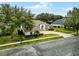 An aerial view of a house with a paved driveway at 1869 Merlot Dr, Sanford, FL 32771
