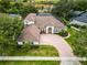Stunning aerial view of a single Gathering home with solar panels at 1869 Merlot Dr, Sanford, FL 32771