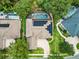 Aerial view showcasing home's solar panels and pool at 1869 Merlot Dr, Sanford, FL 32771